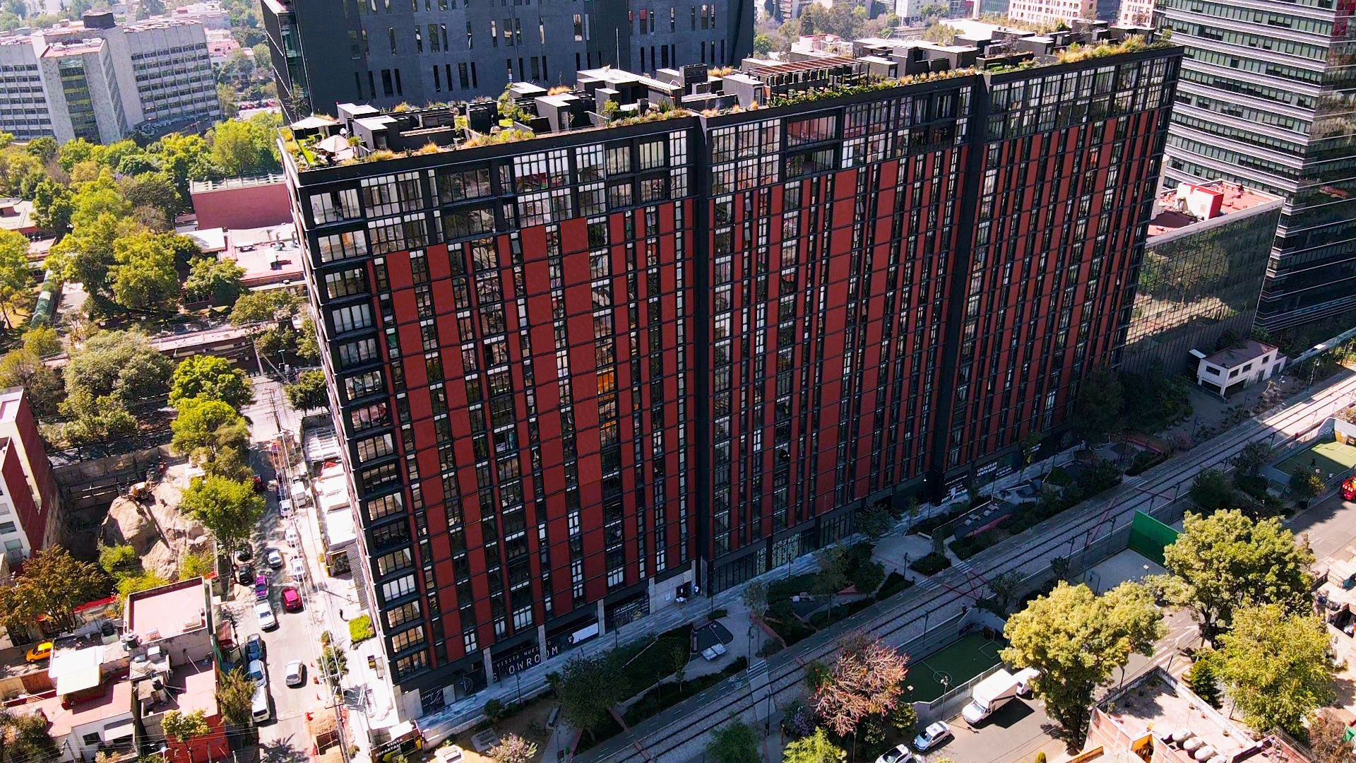 Livix: torres residenciales de fachada roja y negra en Ciudad de México