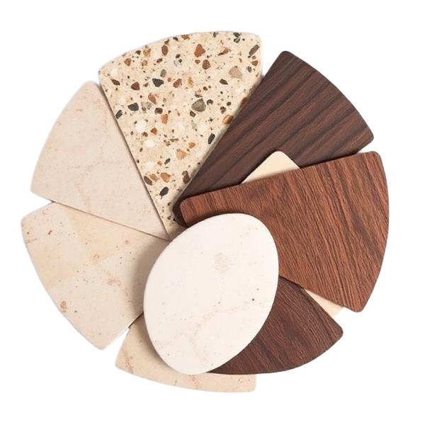Abanico de muestras de nuevos materiales: travertino, terrazo, bronce y madera oscura